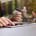 woman using a virtual terminal to process a credit card